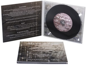 Black vinyl CDs in printed card 4 page digipaks