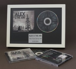 CD booklet and 12cm disc in presentation frame