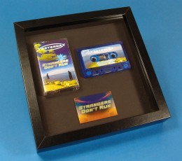 Presentation frame with blue transparent cassette and printed metal plaque