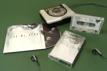 Silver glitter cassette tapes with matching CDs in printed card wallets