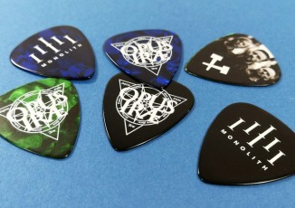 Custom printed green, blue and black guitar picks