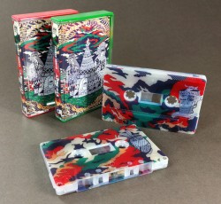 Clear frosted cassette tapes with a full coverage, full colour on-body printing in green and red tape cases