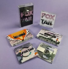 Cassettes and MiniDiscs with custom white base layers for unique reveals on the tapes and MiniDiscs