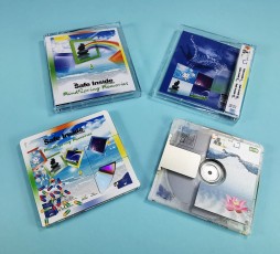 MiniDiscs with partial white and colour front prints to reveal a section of the MiniDisc