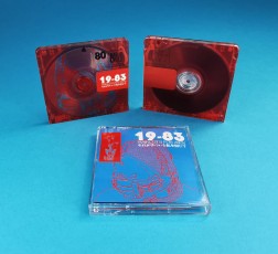Clear MiniDiscs with a white base only under the metal clip area, creating a custom transparent red MiniDisc