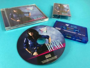 Transparent blue cassette tapes and matching CDs in jewel cases