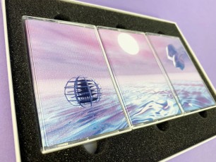 Three cassette tape box set with holographic foil print lid, custom foam insert, and white cassettes in tape cases with on-body full transparent printing for stunning effect
