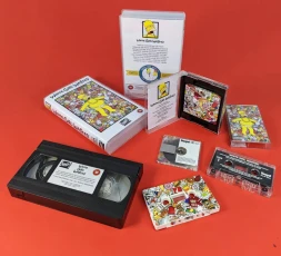 A matching set of VHS tapes, cassettes, and MiniDiscs with on-body print, labels, inserts and cases.