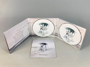 6 page digipak with 2 disc trays and booklets in outter left pockets