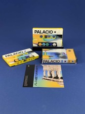 Yellow cassette shells with on body printing in black backed cases with full colour printed J-cards