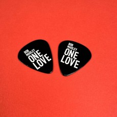 Black guitar picks with white on-body printing