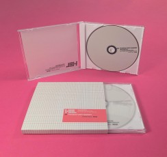 CD jewel cases with white trays, tracing paper inserts and outer O-cards.
