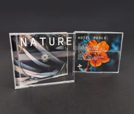 White on-body jewel case printing on the front and rears of the clear cases