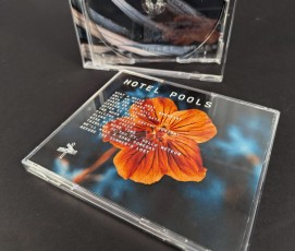 White on-body jewel case printing on the front and rears of the clear cases