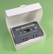 Custom clamshell-style watch box to hold a cassette tape