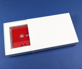 Custom sliding matchbox for a cassette tape in a Norelco case with inner padding