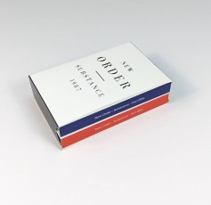 New Order double cassette tapes in O-cards within an outer slipcase