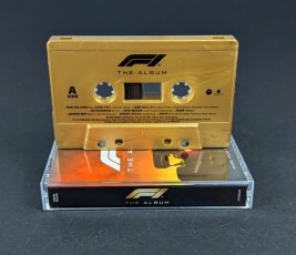 F1 The Album film soundtrack on vintage gold cassette tapes
