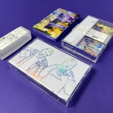 Holographic foil printed J-card cassette tapes with full colour on-body printing and horizontal obi strips