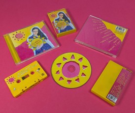 Summer Woods 'Sunshine I Swear' CDs in jewel cases with transparent dark yellow CD trays and cassette tapes in yellow back cases