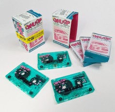 Bespoke printed slipcases to hold three cassette cases with horizontal obi strips