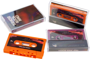 Retro orange and blackberry purple audio cassette tapes