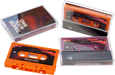 Retro orange and blackberry purple audio cassette tapes