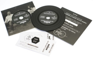 Record-style wedding wallets with black vinyl-style CDs and a matt laminate