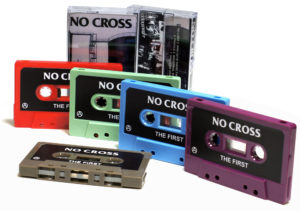 Red, sage green, baby blue, blackberry purple and cocoa brown cassettes with black and white sticker printing and matching J-cards