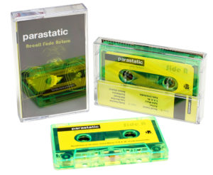 An eye-catching transparent green cassette with yellow and black artwork