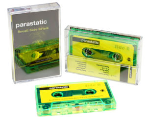 An eye-catching transparent green cassette with yellow and black artwork