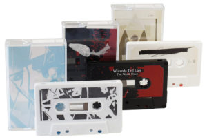 A set of three different cassettes with printed J-card inserts