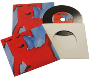 Vinyl CDs in printed card wallets with a larger outer printed wallet and finished with cellophane wrapping