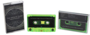 A set of green transparent cassettes with sticker printing in printed jewel cases