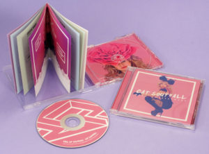 Jewel cases with sixteen page booklets, double sided rear tray inlays with clear disc trays and matching discs