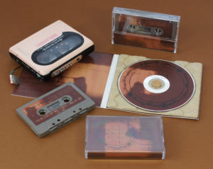 A set of cocoa brown cassettes in cases with J-cards and matching CDs in our 100% recycled eco digipaks