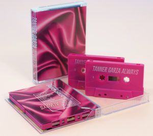 A set of hot pink double cassettes in double stacked cases with large full colour J-cards