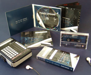 A four page digipak and matching cassette in clear case with outer O-card