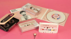 A matching set of white cassettes and white vinyl CDs in digipaks