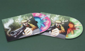 Funky coloured CDs in two colour variations, packed in gloss laminated wallets