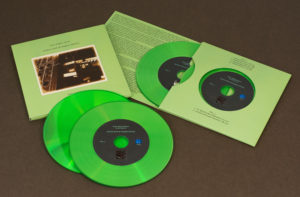 A set of two green vinyl CDs in our 4 page double disc record-style wallets