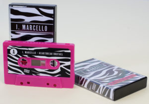 A set of hot pink cassettes with sticker printing