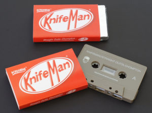Cocoa brown cassette tapes in printed O-cards that the customer then wrapped in foil to look just like a KitKat!