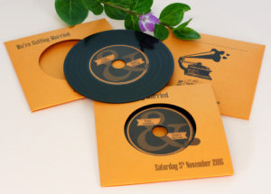 Record-style CD wallet wedding invitations with black vinyl CDs