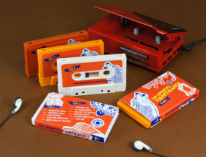 A set of white, yellow and retro orange cassettes in full colour printed O-cards