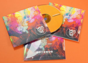 A colourful set of orange base CDs in matt laminated wallets for a silk feel and finished with a cellophane wrap