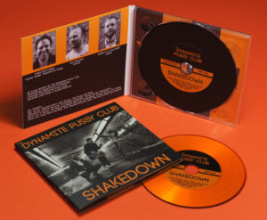 A set of mixed orange and black vinyl CDs in matt laminated 4 page digipaks