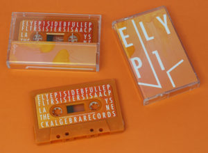 Retro orange cassettes with full colour stickers in clear cassette cases with a full colour printed J-card