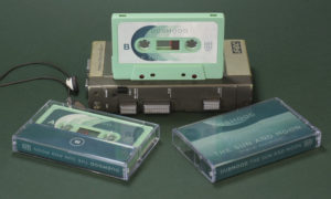 Our sage green cassettes with stickers and fantastic matching 6 panel J-cards