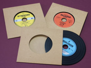 A set of three different black vinyl disc designs for a wedding